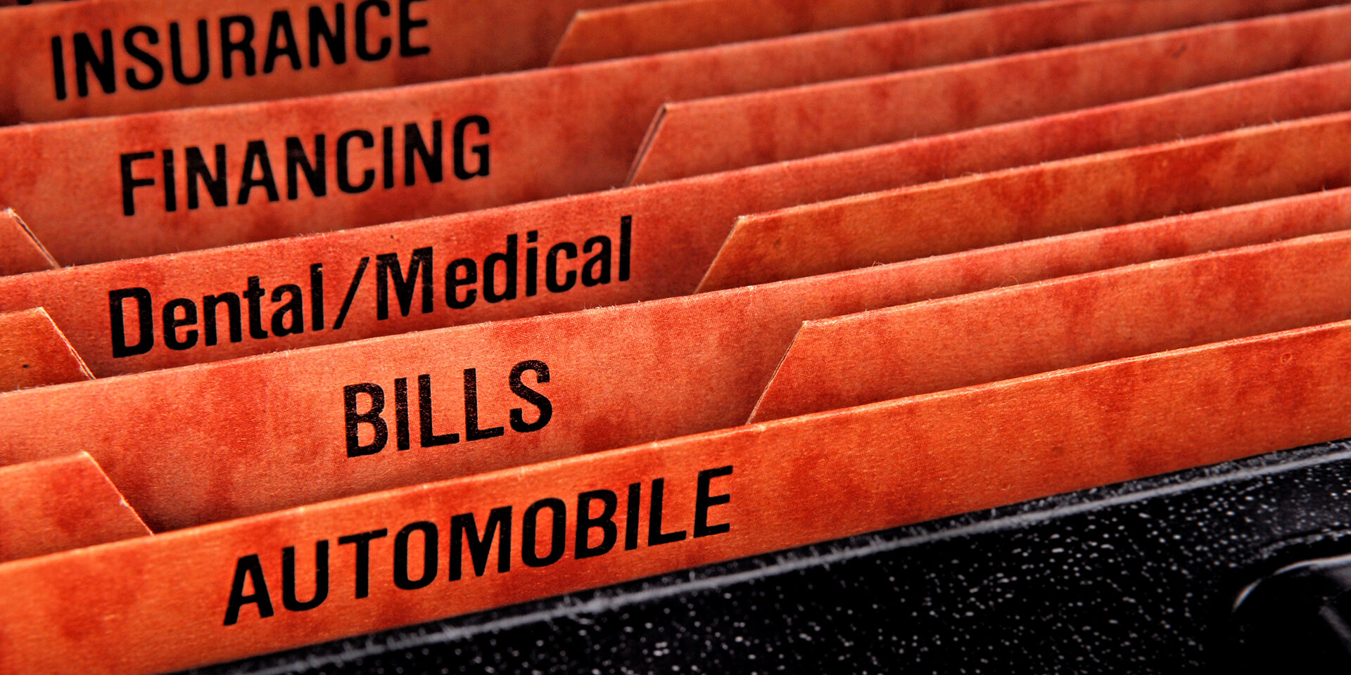 Filing folders for recording expenses featuring automobile slot